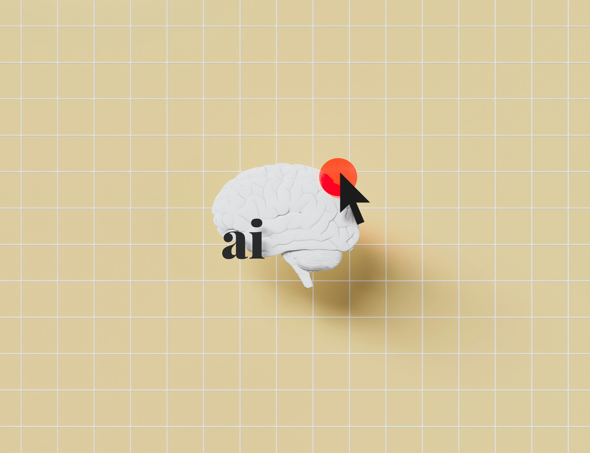 A model brain on a yellow grid, marked by a cursor and a red dot