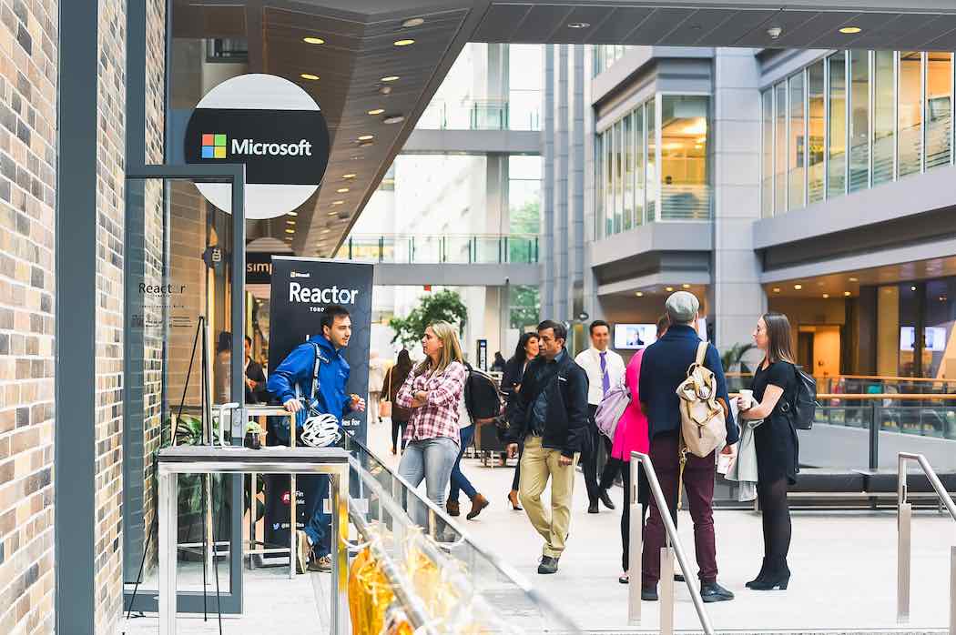 Microsoft Reactor Toronto at CIBC Square, people arriving for a session
