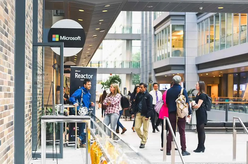 Microsoft Reactor Toronto at CIBC Square, people arriving for a session